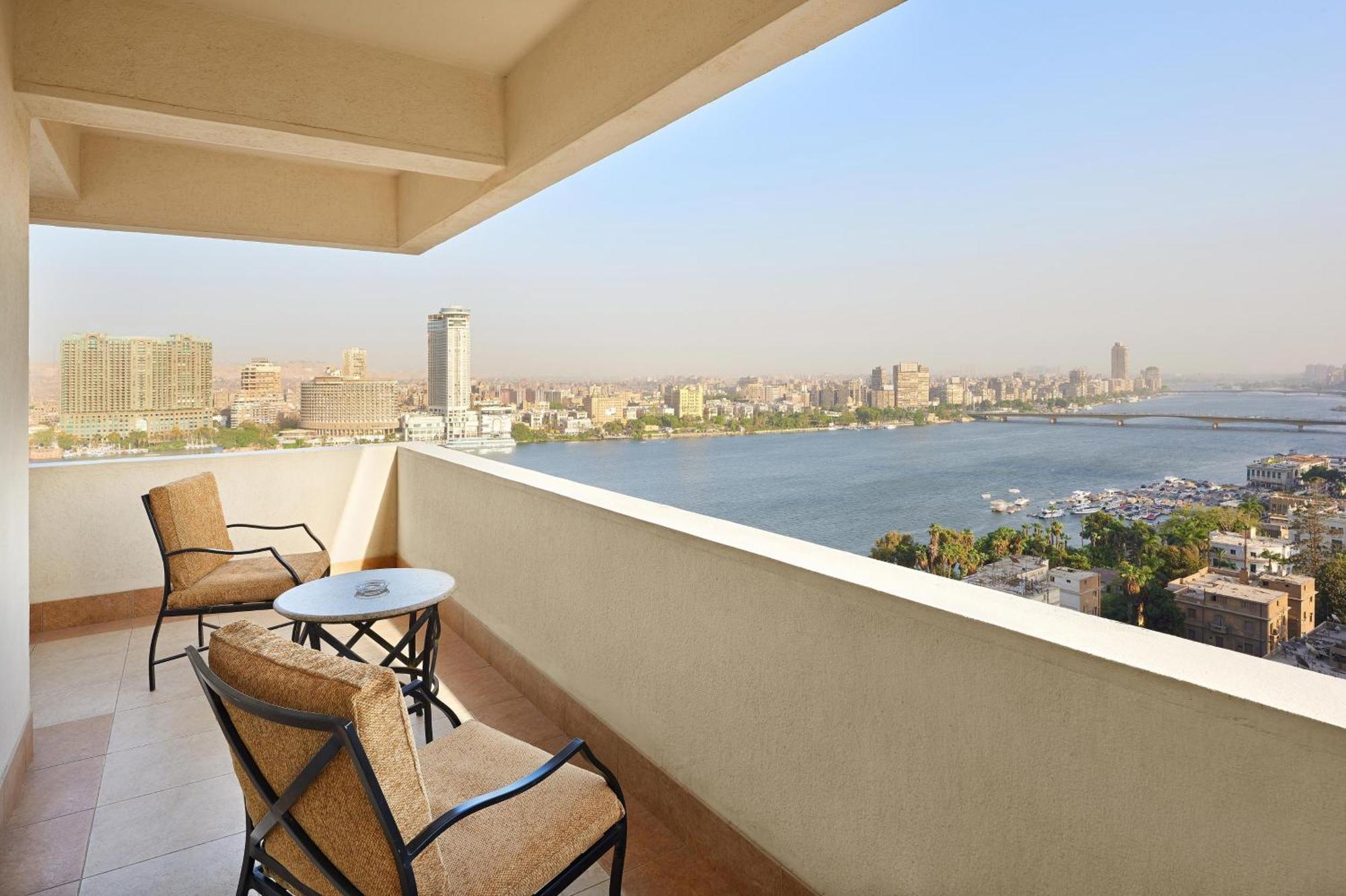 Premium King Room with Balcony and Partial River View,1615647082:JPEG